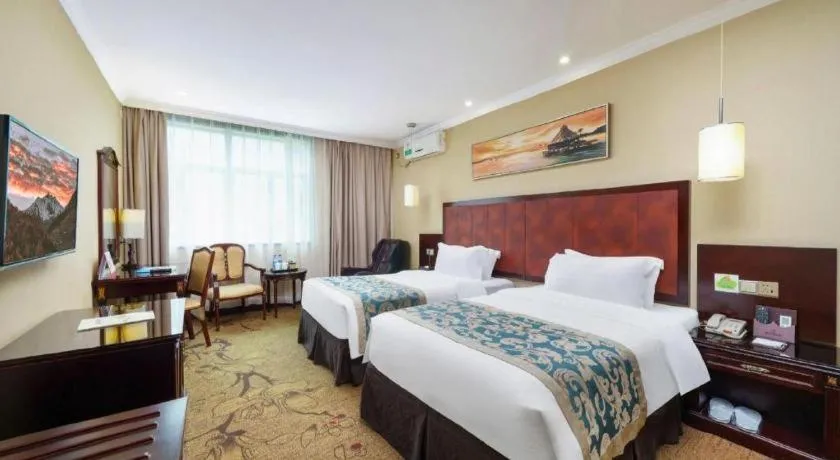 Bed in Sun Island Holiday Hotel