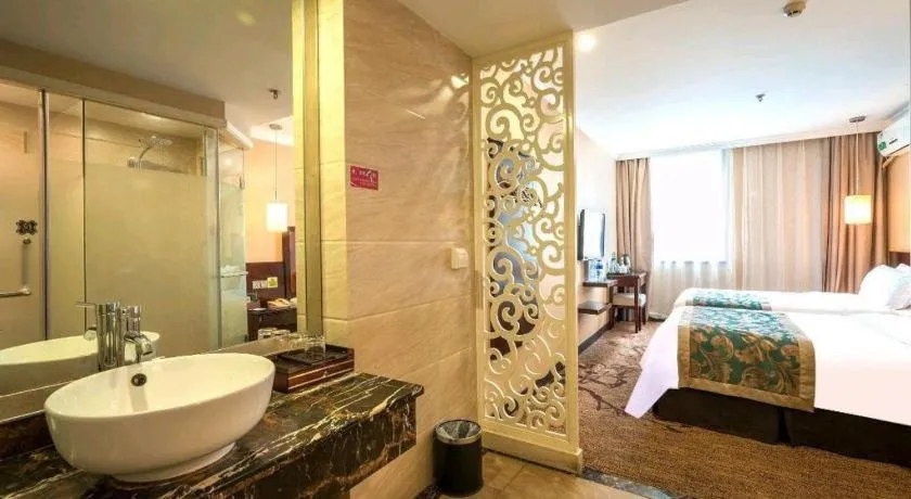 Bed in Sun Island Holiday Hotel