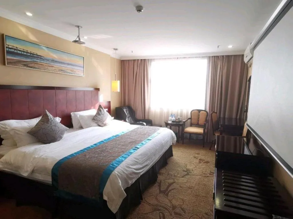 Bed in Sun Island Holiday Hotel