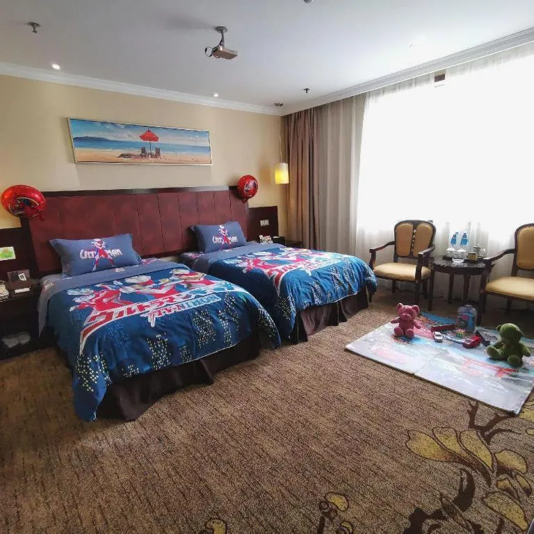 Bed in Sun Island Holiday Hotel