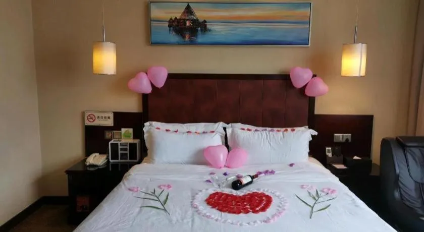 Bed in Sun Island Holiday Hotel