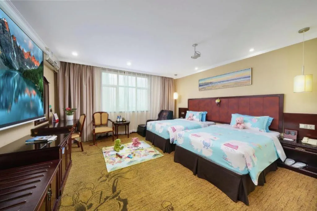 Bed in Sun Island Holiday Hotel