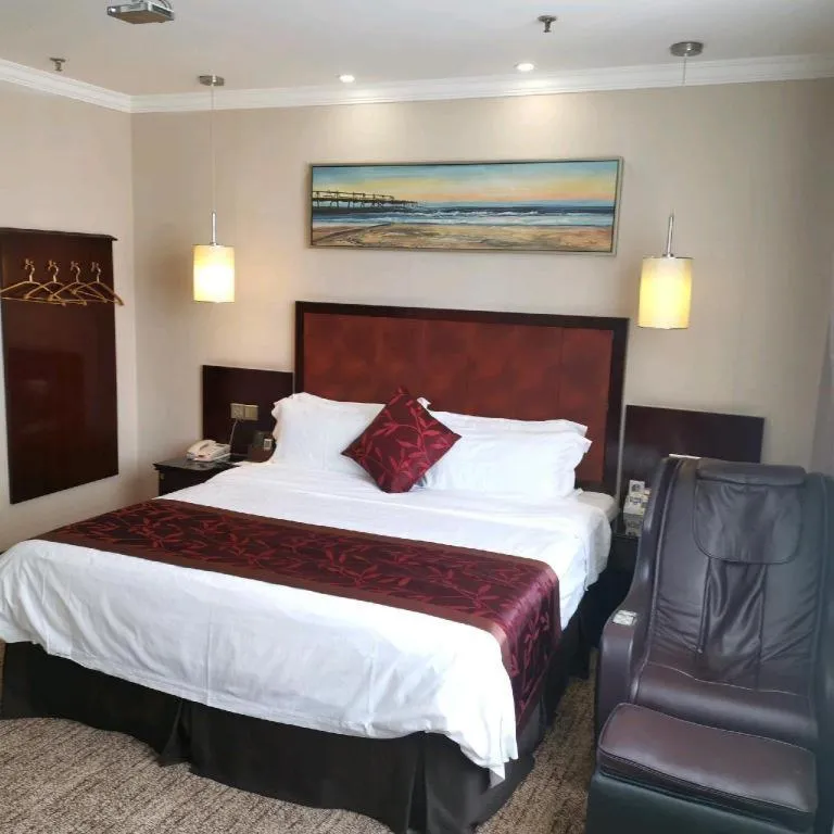 Bed in Sun Island Holiday Hotel