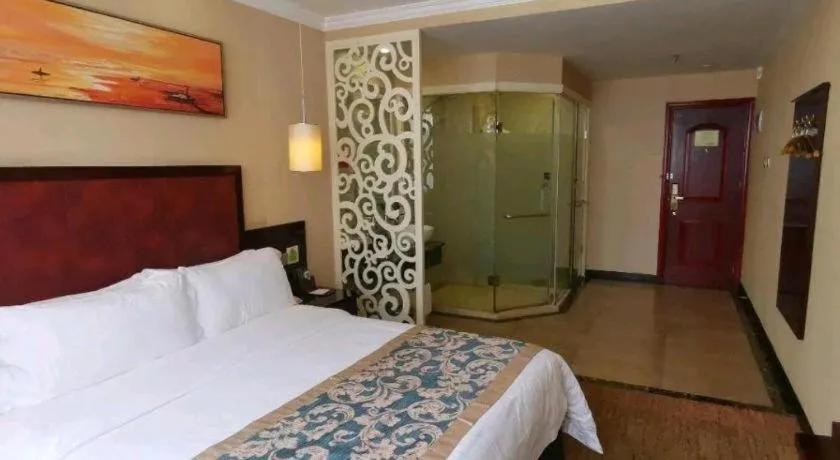 Bed in Sun Island Holiday Hotel