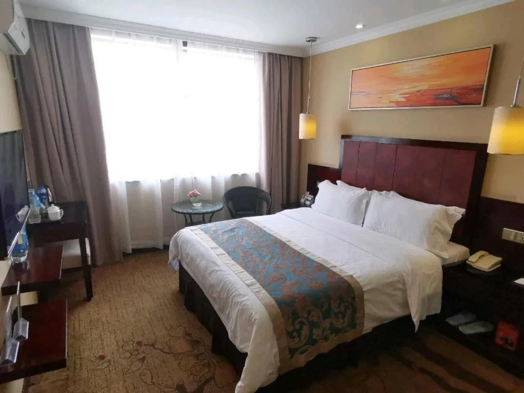 Bed in Sun Island Holiday Hotel