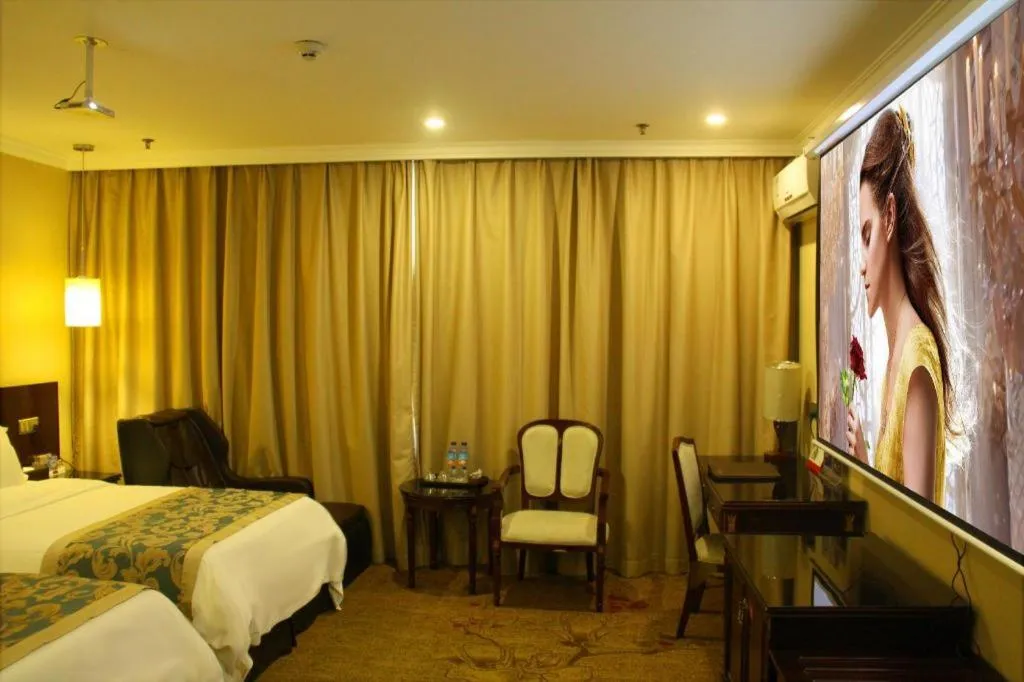 Bed in Sun Island Holiday Hotel