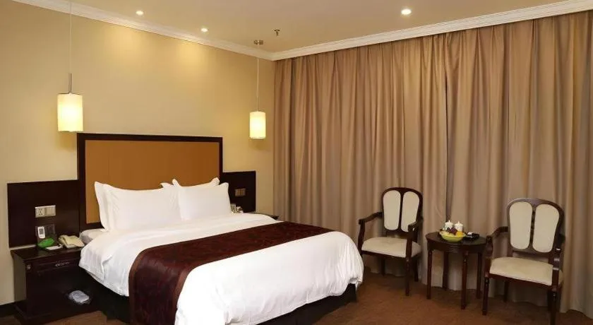 Bed in Sun Island Holiday Hotel