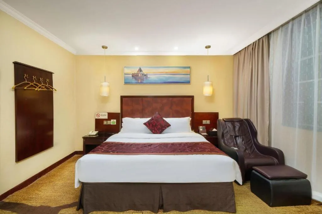 Bed in Sun Island Holiday Hotel