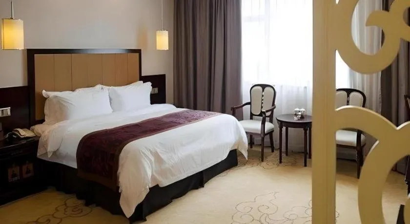 Bed in Sun Island Holiday Hotel