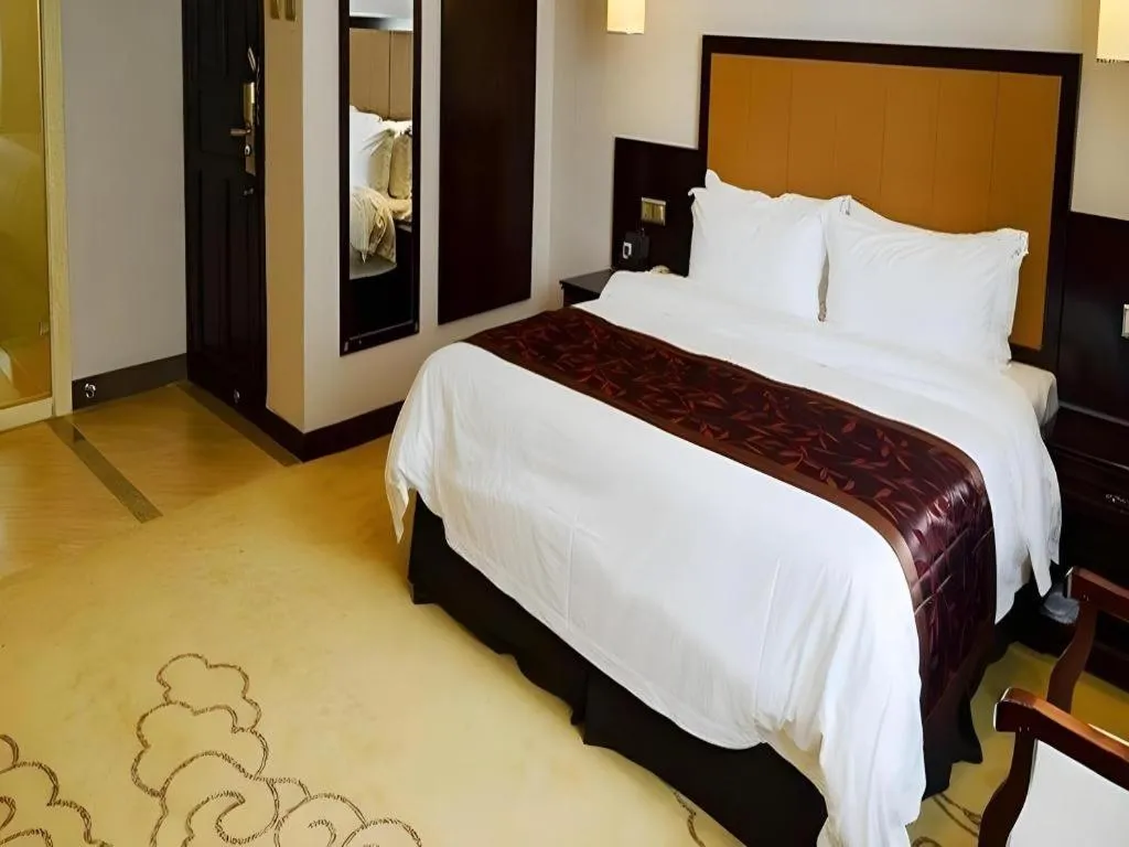 Bed in Sun Island Holiday Hotel