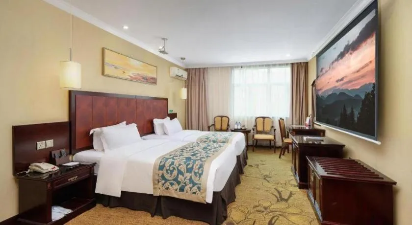 Bed in Sun Island Holiday Hotel