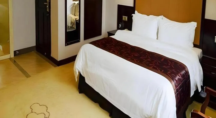 Bed in Sun Island Holiday Hotel