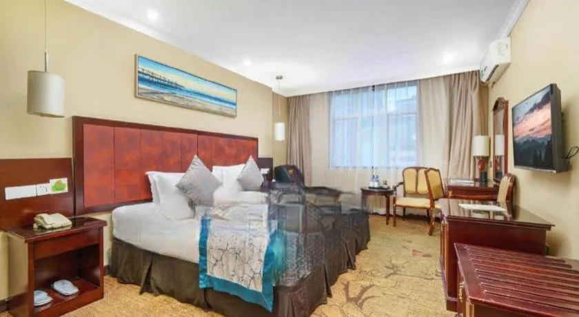 Bed in Sun Island Holiday Hotel