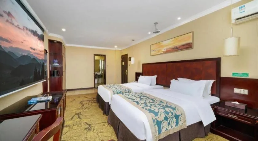 Bed in Sun Island Holiday Hotel