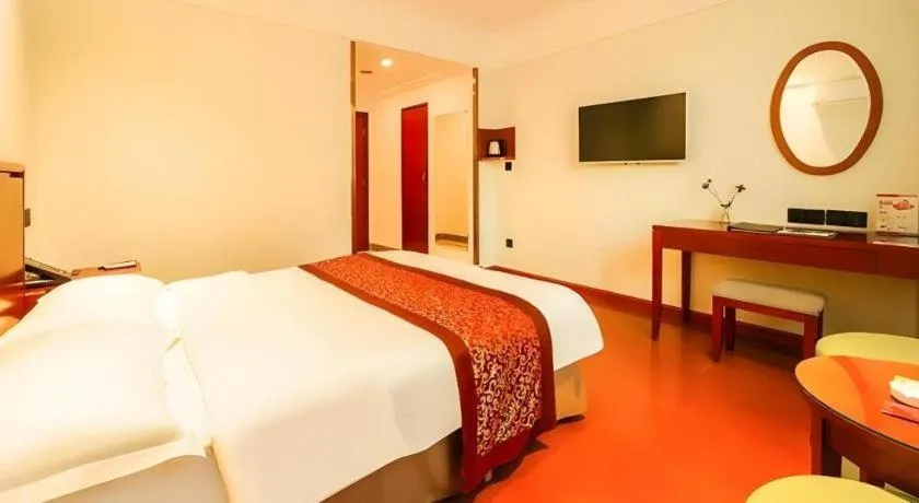 Bed in GreenTree Inn Suzhou Wuzhong