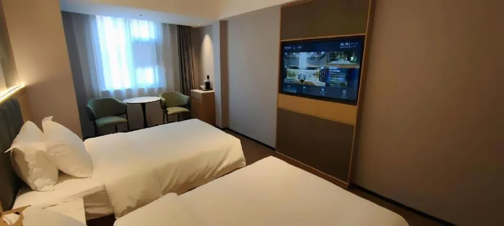 Bed in GreenTree Inn Suzhou Wuzhong