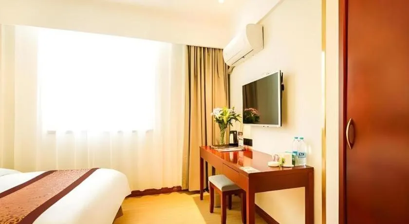 Bed in GreenTree Inn Suzhou Wuzhong