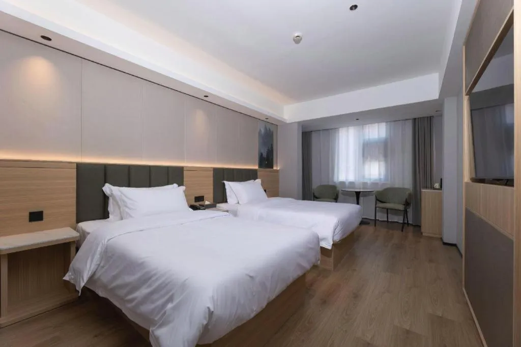 Bed in GreenTree Inn Suzhou Wuzhong