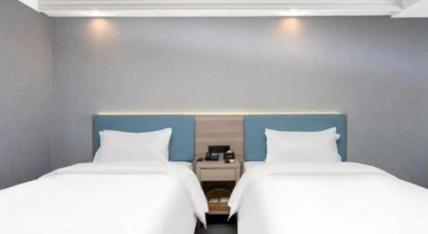 Bed in GreenTree Inn Hotel - Nantong Hongming Plaza