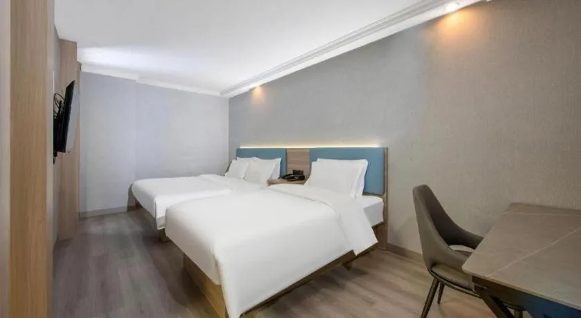 Bed in GreenTree Inn Hotel - Nantong Hongming Plaza