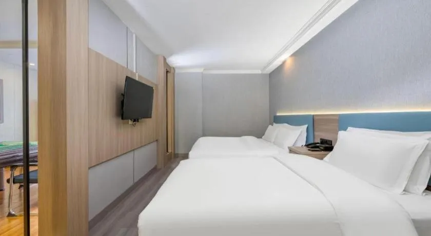 Bed in GreenTree Inn Hotel - Nantong Hongming Plaza