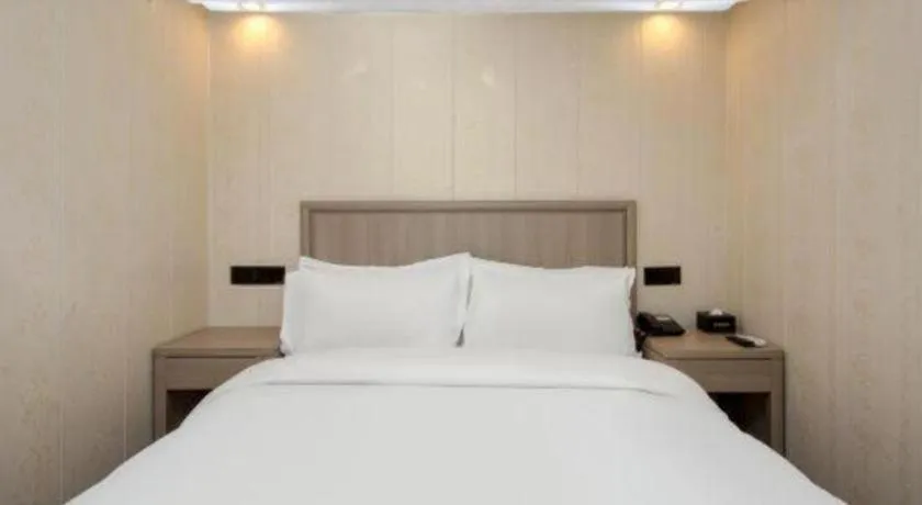 Bed in GreenTree Inn Hotel - Nantong Hongming Plaza