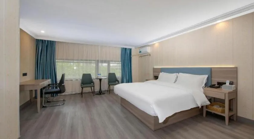 Bed in GreenTree Inn Hotel - Nantong Hongming Plaza