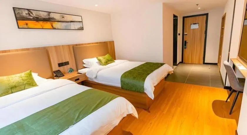 Bed in GreenTree Inn Shanghai Xupu Bridge Hotel