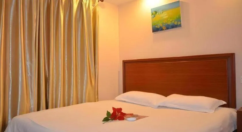 Bed in GreenTree Inn Shanghai Xupu Bridge Hotel