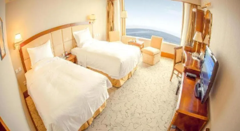 Bed in Golden Bay Hotel Weihai