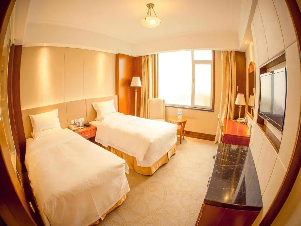 Bed in Golden Bay Hotel Weihai