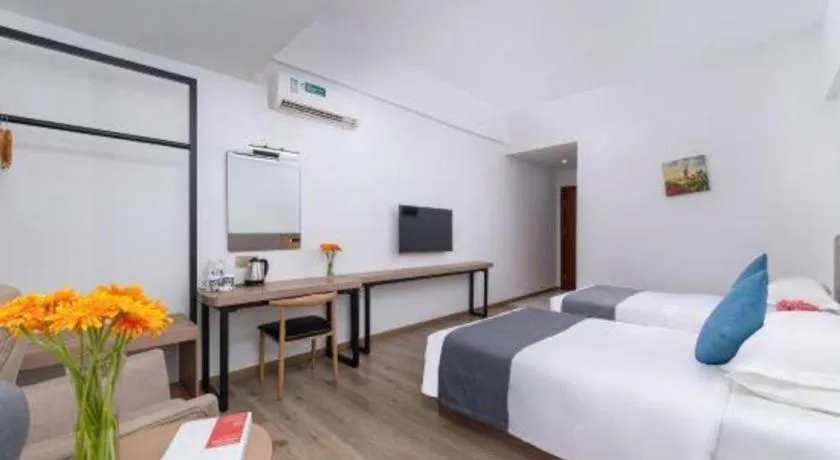 Bed in GreenTree Inn Zhongshan Nanlang Metro Station Branch