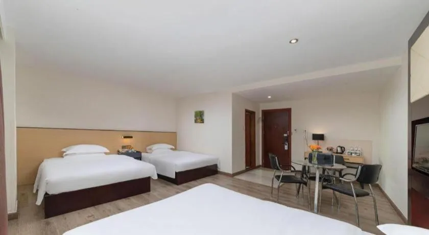 Bed in GreenTree Inn Zhongshan Nanlang Metro Station Branch