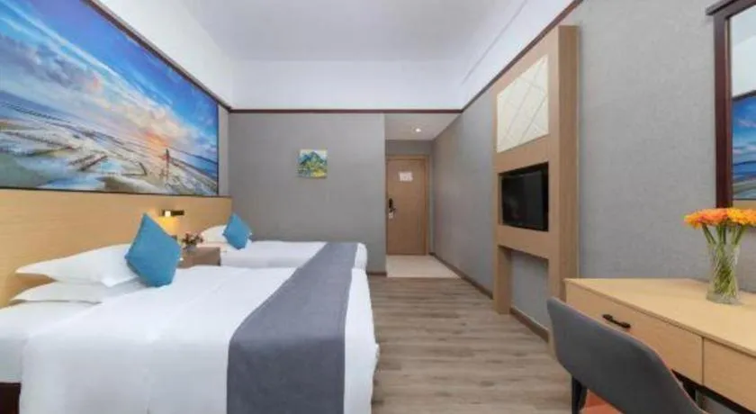 Bed in GreenTree Inn Zhongshan Nanlang Metro Station Branch