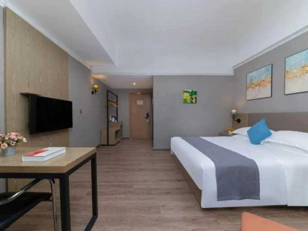 Bed in GreenTree Inn Zhongshan Nanlang Metro Station Branch