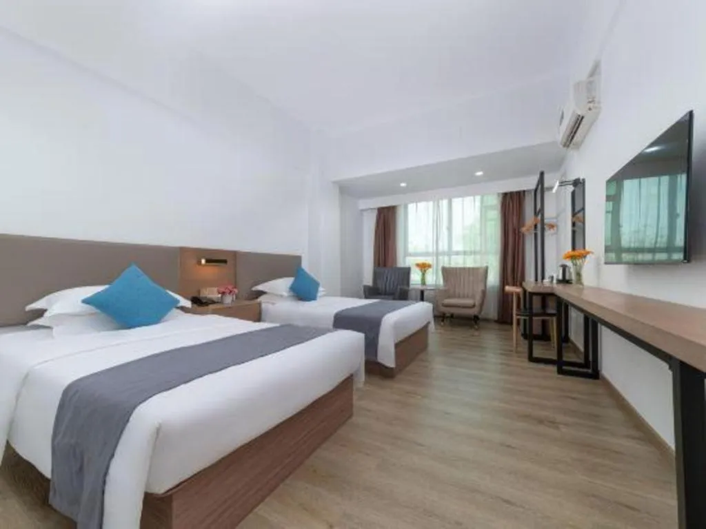 Bed in GreenTree Inn Zhongshan Nanlang Metro Station Branch