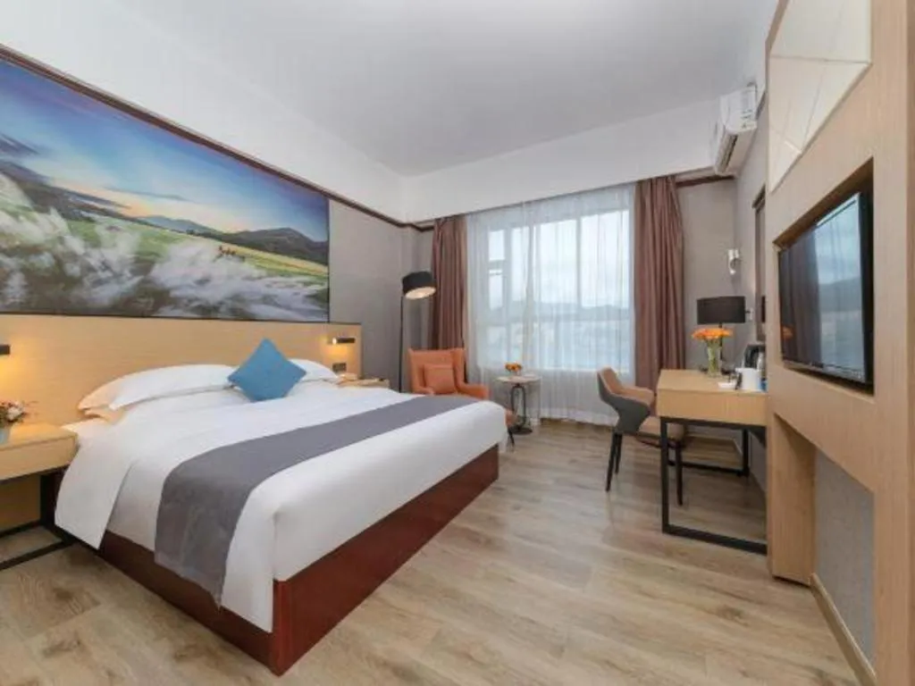 Bed in GreenTree Inn Zhongshan Nanlang Metro Station Branch