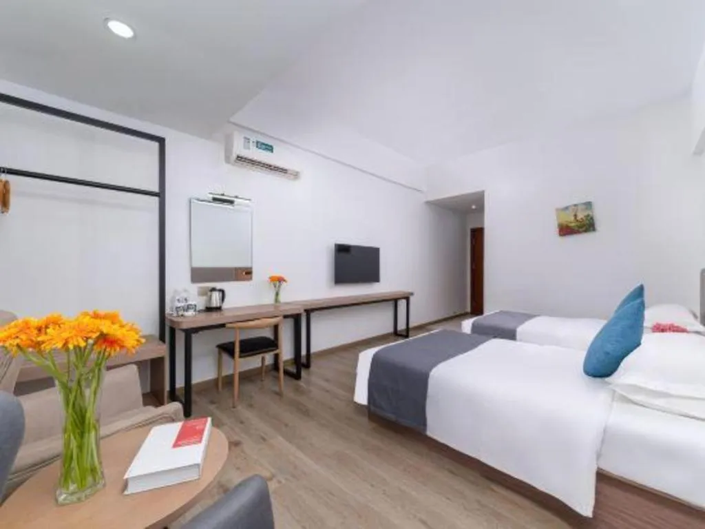 Bed in GreenTree Inn Zhongshan Nanlang Metro Station Branch