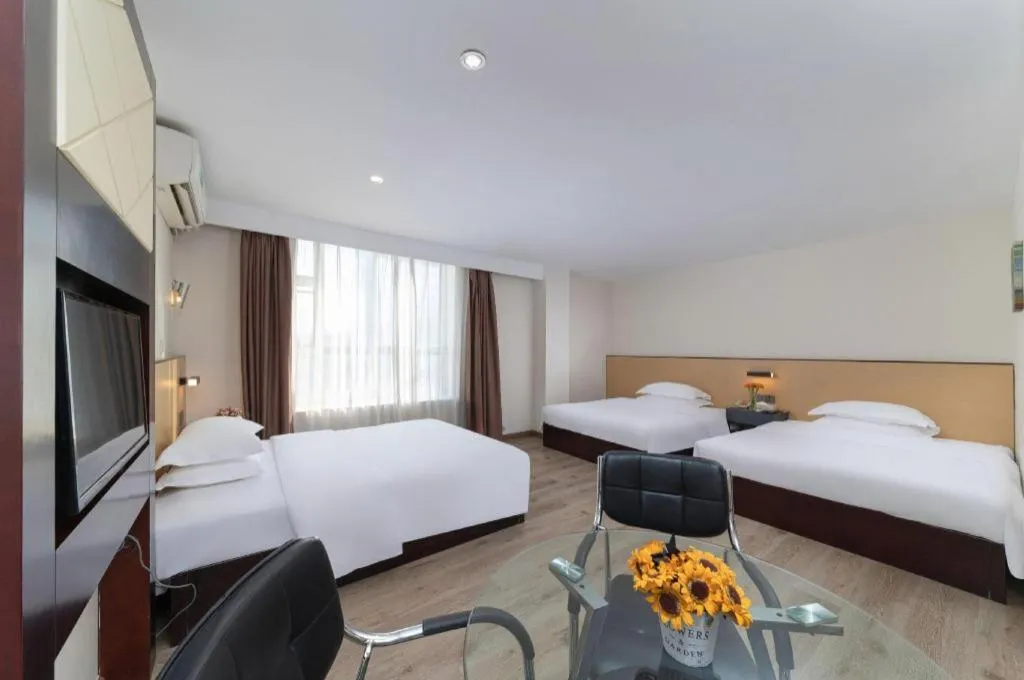 Bed in GreenTree Inn Zhongshan Nanlang Metro Station Branch