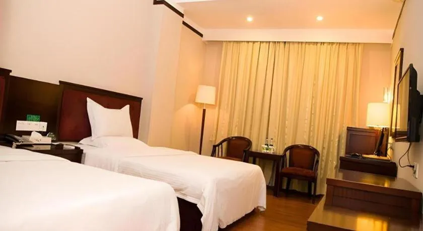 Bed in GreenTree Inn Zhongshan Nanlang Metro Station Branch