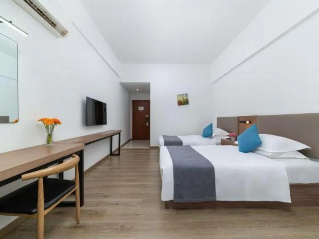 Bed in GreenTree Inn Zhongshan Nanlang Metro Station Branch