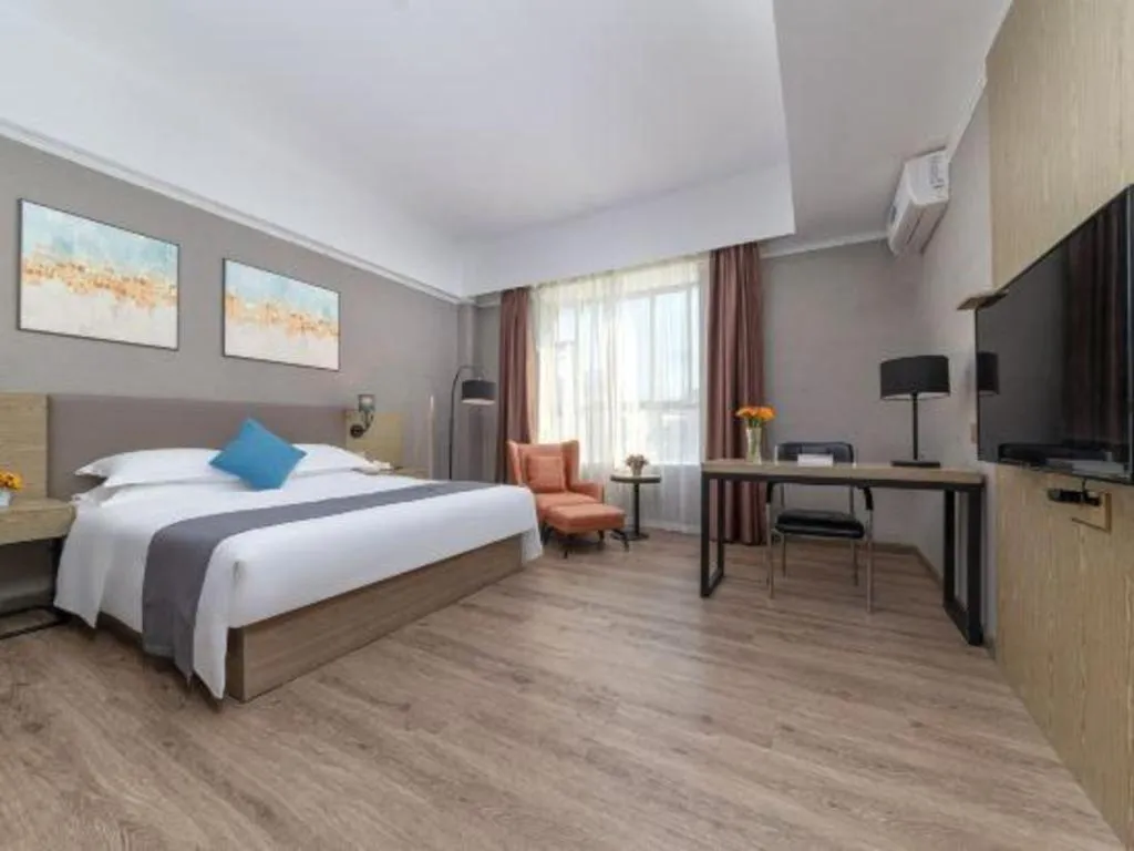 Bed in GreenTree Inn Zhongshan Nanlang Metro Station Branch