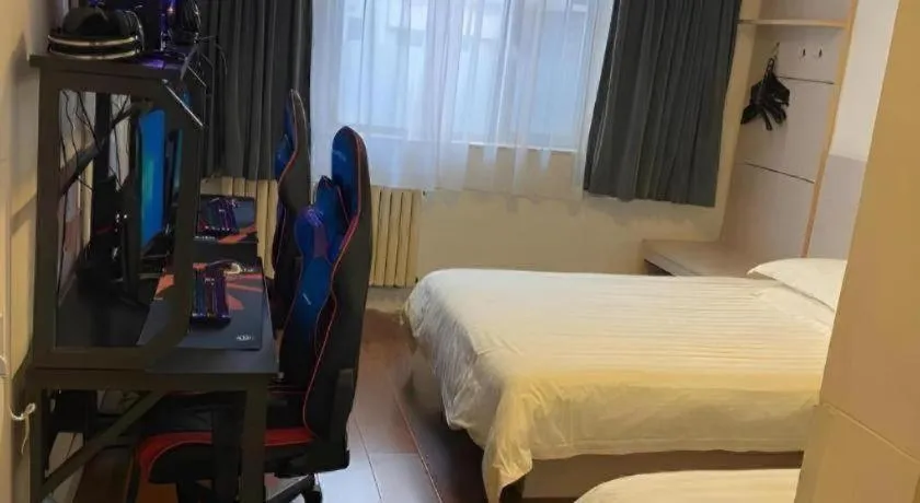 Bed in Jinjiang Inn Qingdao Wuxi Square Nanjing Road Metro Station