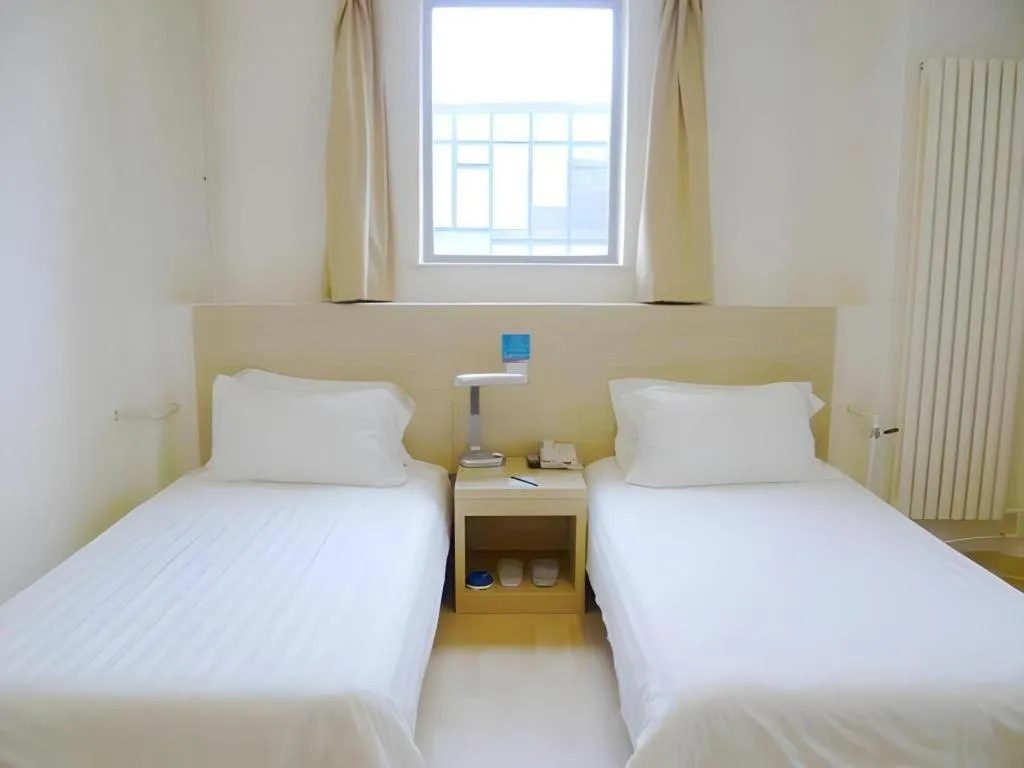 Bed in Jinjiang Inn Qingdao International Exhibition Center Haier Road