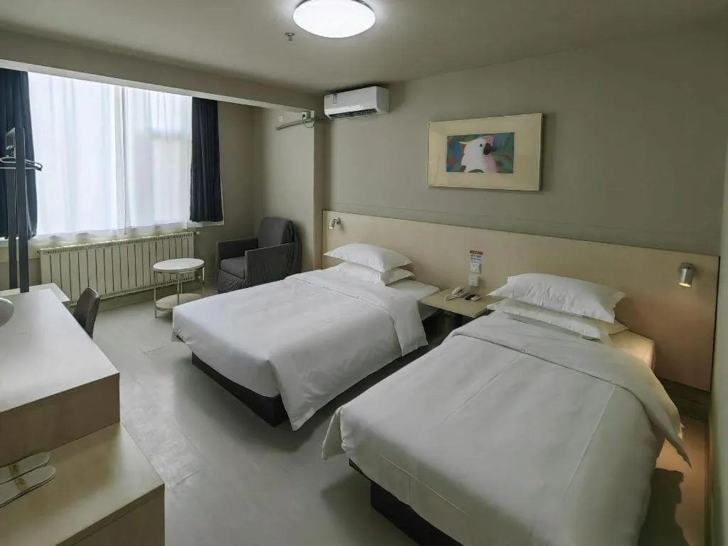 Bed in Jinjiang Inn Qingdao International Exhibition Center Haier Road