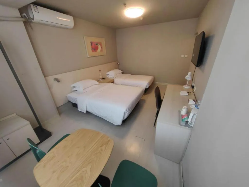 Bed in Jinjiang Inn Qingdao International Exhibition Center Haier Road