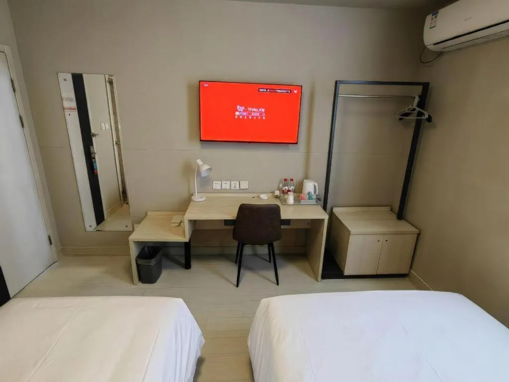 Bed in Jinjiang Inn Qingdao International Exhibition Center Haier Road