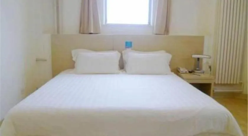 Bed in Jinjiang Inn Qingdao International Exhibition Center Haier Road