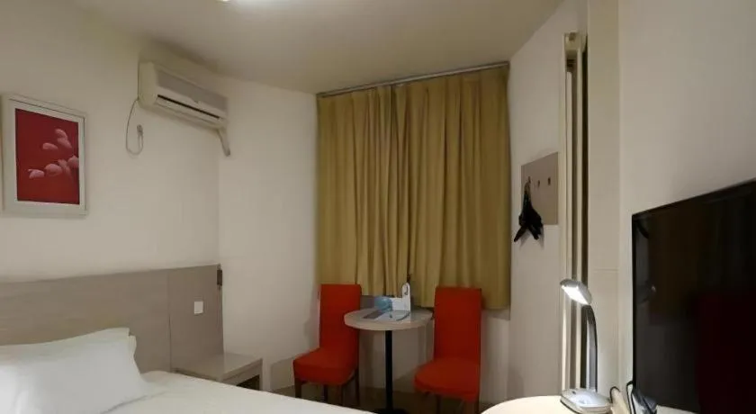 Bed in Jinjiang Inn Qingdao International Exhibition Center Haier Road