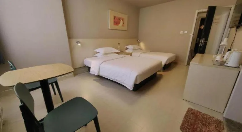 Bed in Jinjiang Inn Qingdao International Exhibition Center Haier Road